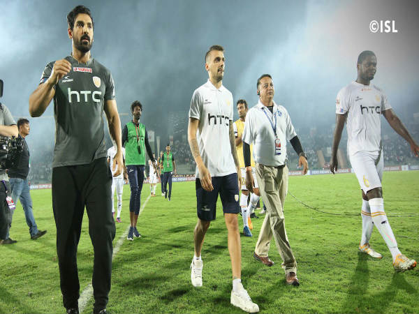 John Abraham (left)
