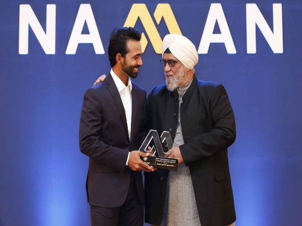 Ajinkya Rahane collects award on the behalf of MCA