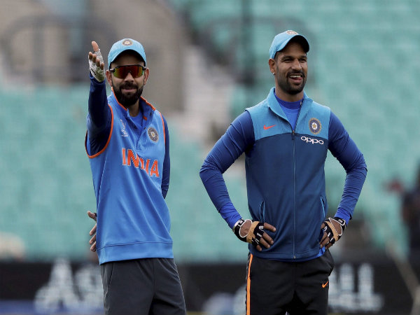Virat Kohli (left) and Shikhar Dhawan