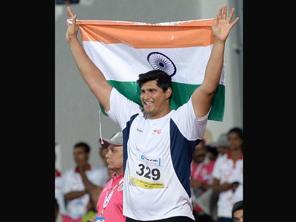 Vikas Gowda with the Tri-colour Indian Flag