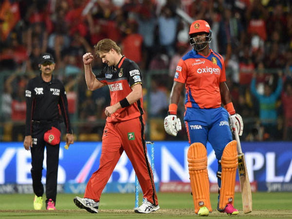 Shane Watson (left)