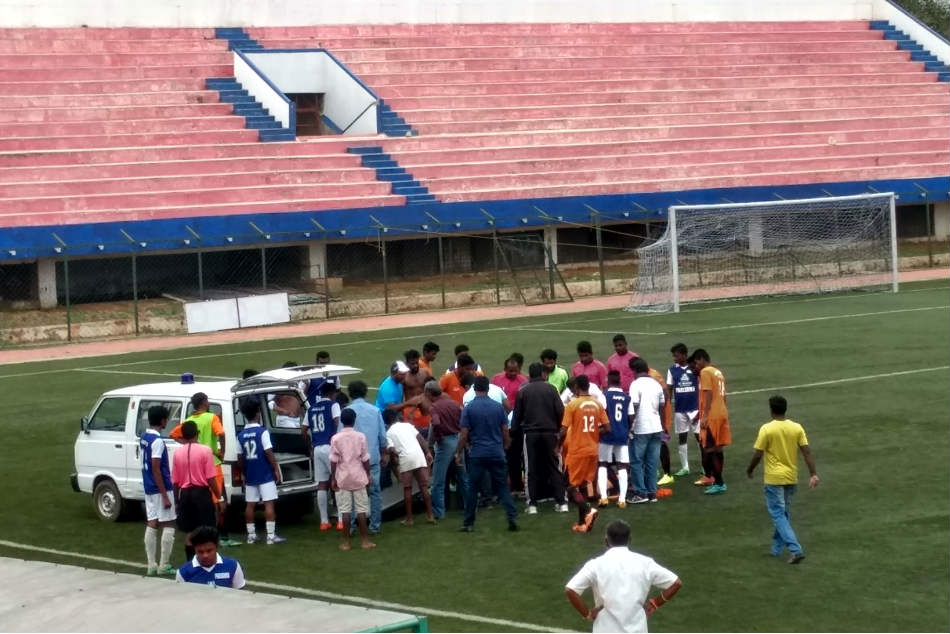 Footballer collapses on field during a local division game, taken to