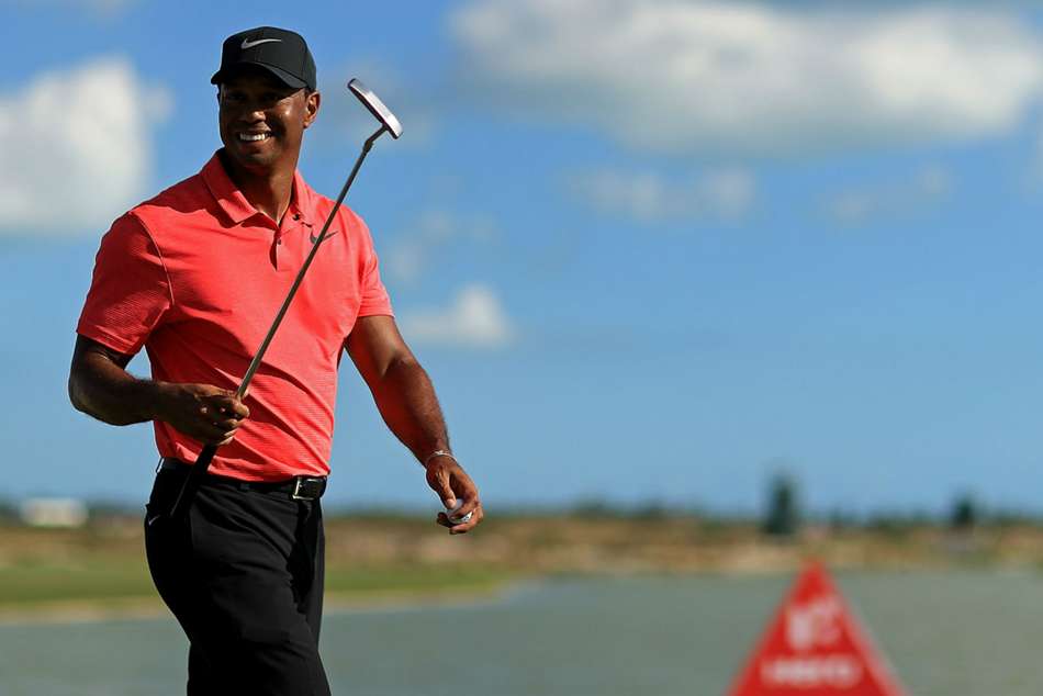 Tiger Woods parts with swing coach myKhel