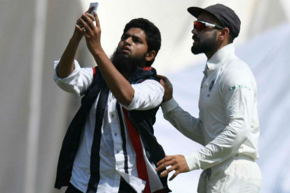 Hyderabad Test Another Fan Breaks Security Cordon To Take Selfie With Hyderabad Test Another Fan Breaks Security Cordon To Take Selfie With