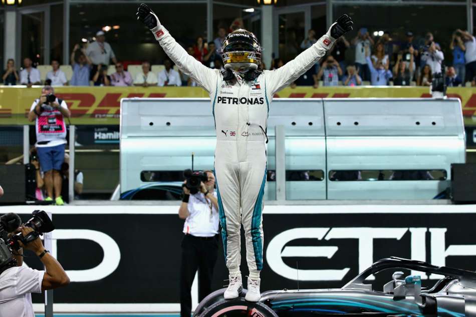 Hamilton storms to Abu Dhabi pole with lap record