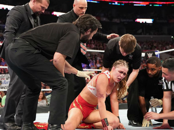 Ronda Rousey assaulted by Charlotte Flair