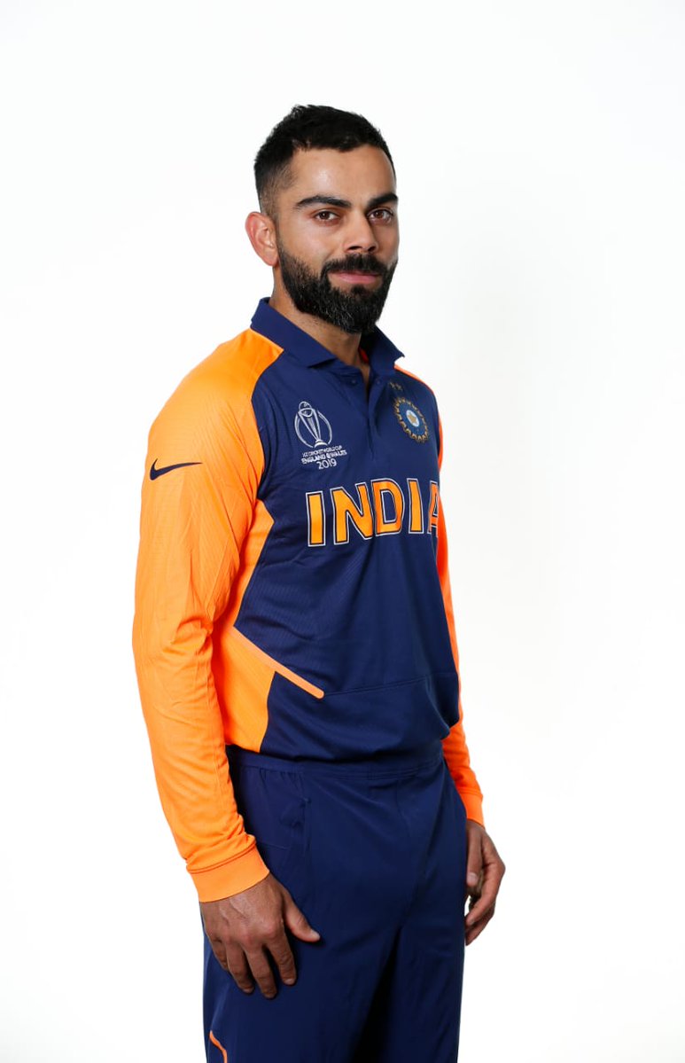 virat kohli in orange jersey