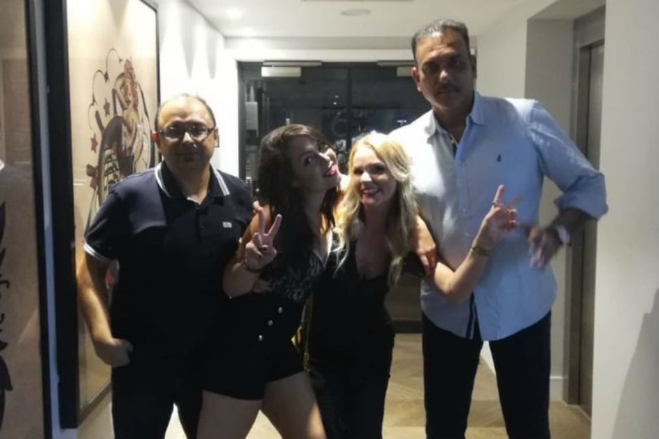 Ravi Shastri trolled on Twitter as image with young female fans goes viral  - myKhel