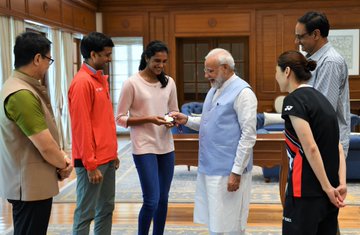 Sindhu accompanied by Sports Minister