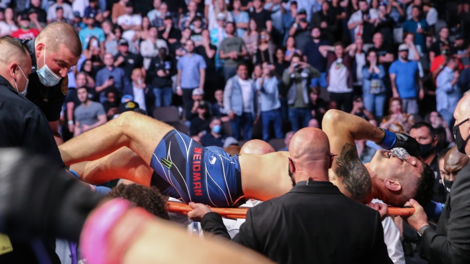 UFC 261: Silva consoles Weidman after gruesome leg injury ...