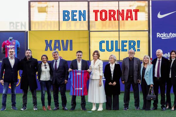 Xavi kicks off with derby win
