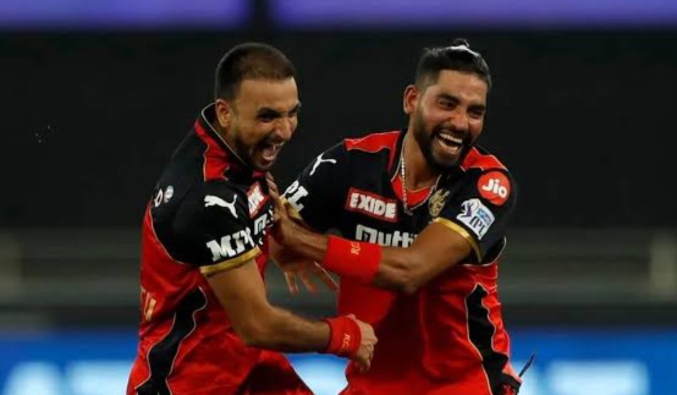 IPL 2022 RCB vs KKR: Harshal Patel creates history with two wicket maidens, Hasaranga shines - myKhel