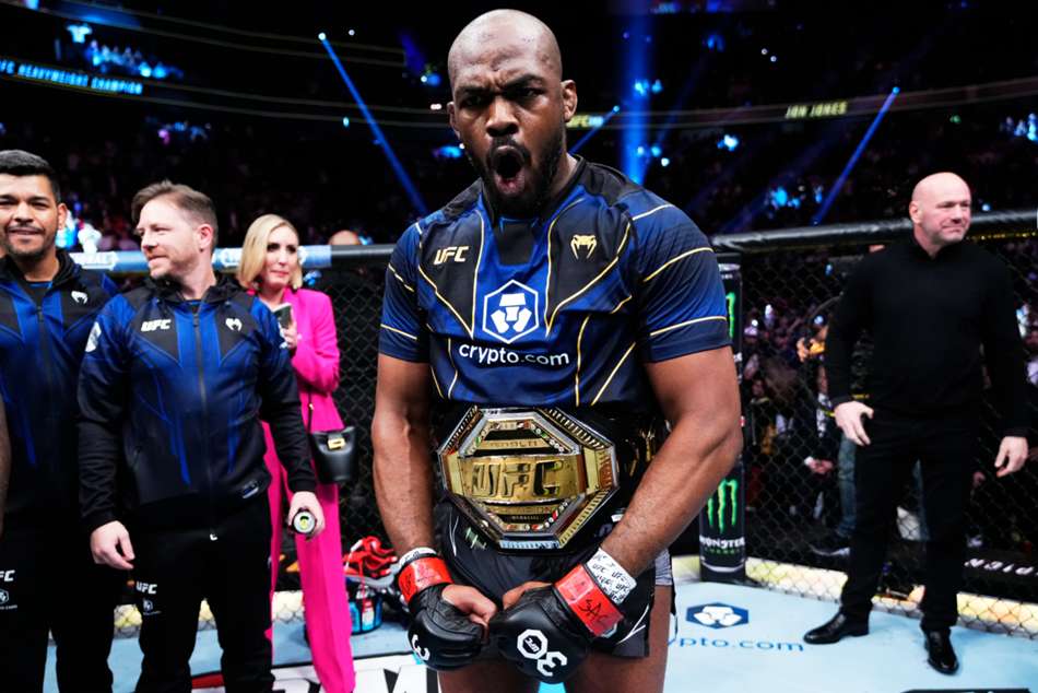 Jon Jones chokes Cyril Gane in first round to claim the heavyweight