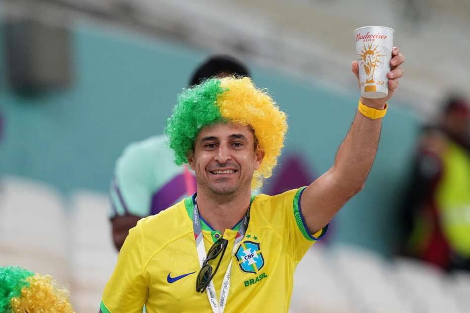 A fan of Brazil drinking a non-alcoholic Budweiser Zero beer at a World Cup match in Qatar last year A fan of Brazil drinking a non-alcoholic Budweiser Zero beer at a World Cup match in Qatar last year