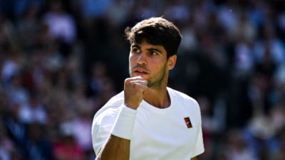 Wimbledon: Alcaraz safely through