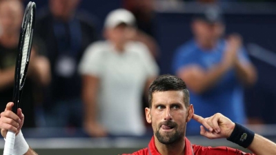 Djokovic edges past Hanfmann
