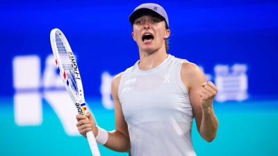 Swiatek through to Wuhan QFs